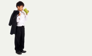 Boy In A Suit Drinking Coffee